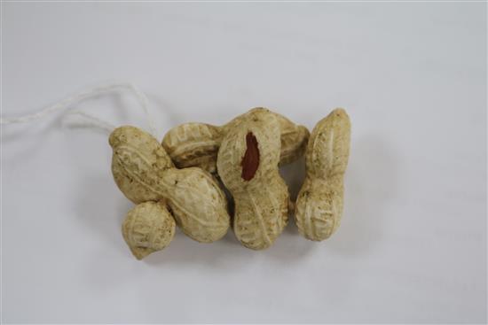 A Japanese Meiji period carved ivory group of peanuts, 5.5cm